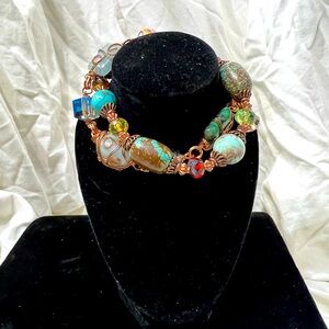 Wire Wrapped Gem Stones In Non Tarnish 20 Gage Wire. A Pair Of Single Bracelets